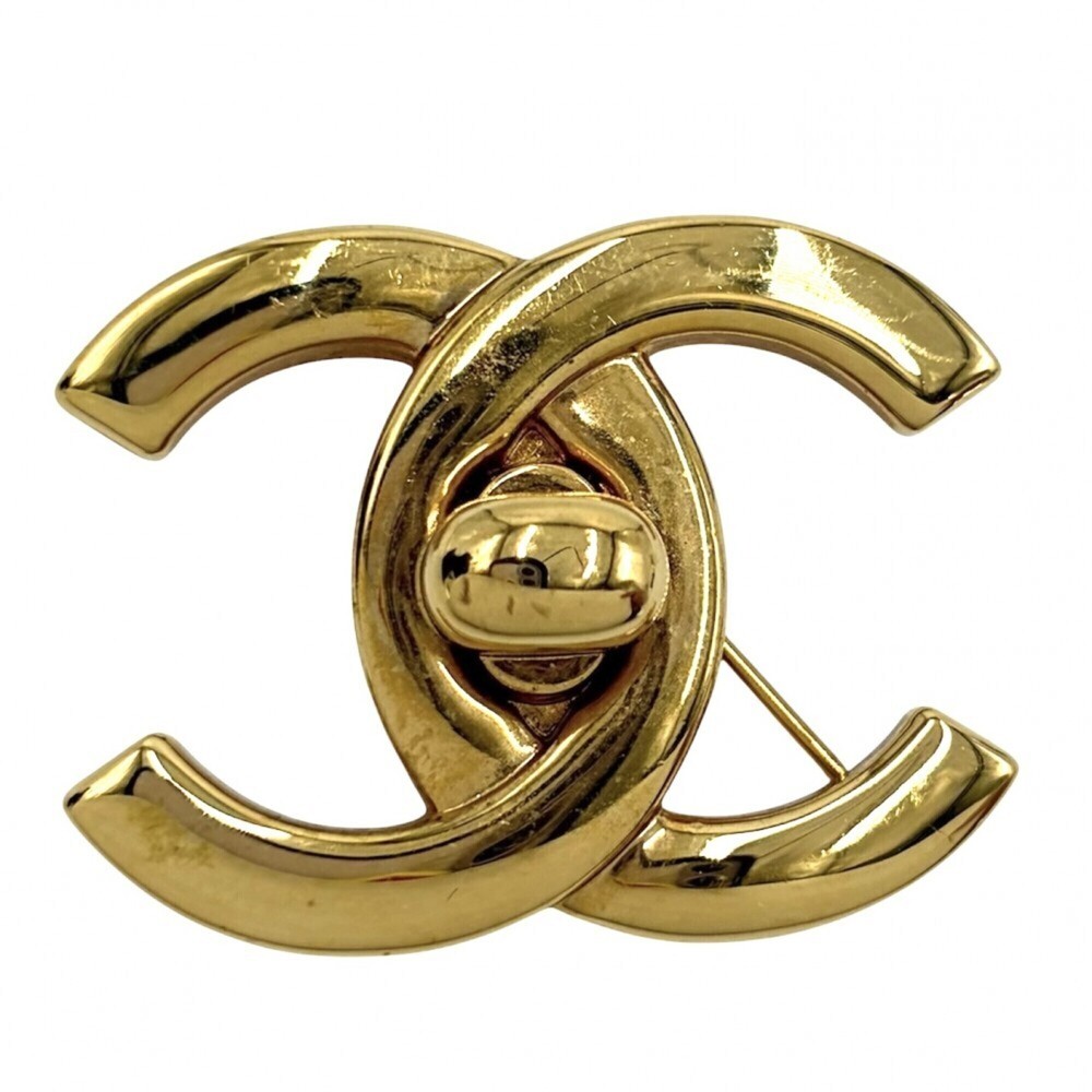 CHANEL Gold Logo Brooch